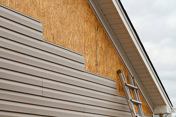 Professional Siding Replacement technician working in Spring Valley, OH